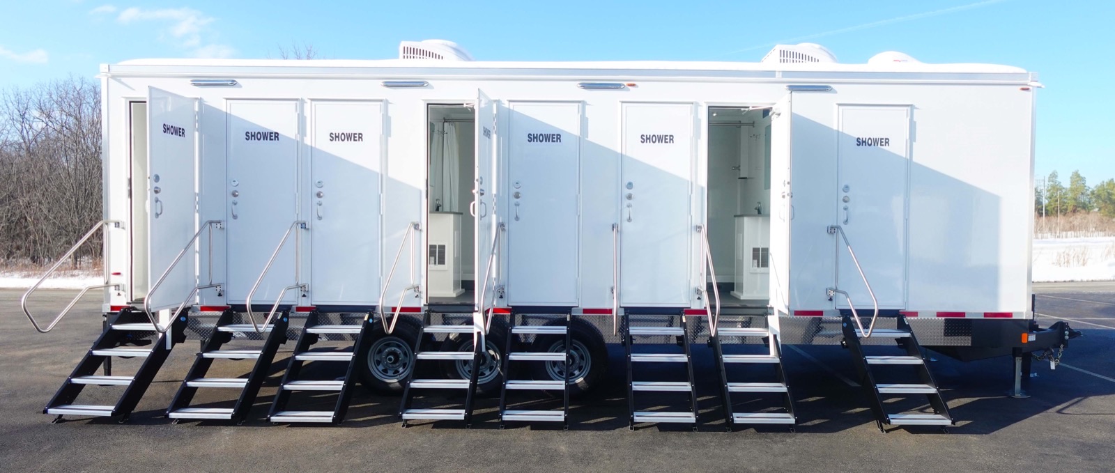 Front doors on a multi stall shower trailer